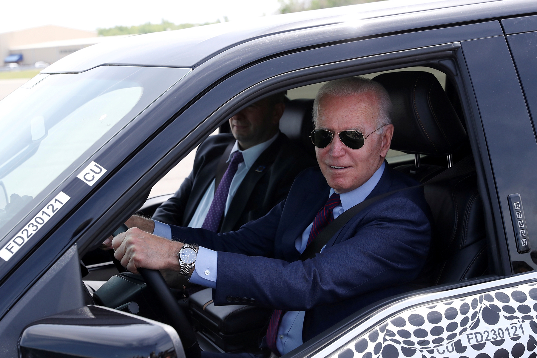 Biden Tests a New Electric Car at a Plant in Michigan