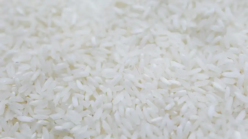 Why should you wash rice before cooking?