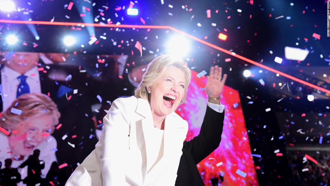 TOPSHOT - Democratic presidential nominee Hillary Clinton celebrates on stage after she accepted the nomination during the fourth and final night of the Democratic National Convention at the Wells Fargo Center, July 28, 2016 in Philadelphia, Pennsylvania.    / AFP / Robyn Beck        (Photo credit should read ROBYN BECK/AFP via Getty Images)