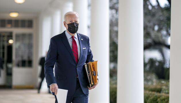 President Joe Biden walks along the Colonnade of the White House Thursday, Jan. 28, 2021, en route to the Oval Office. (Official White House Photo by Adam Schultz)